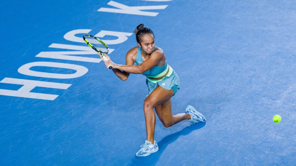 Leylah Fernandez winds up to hit a backhand.