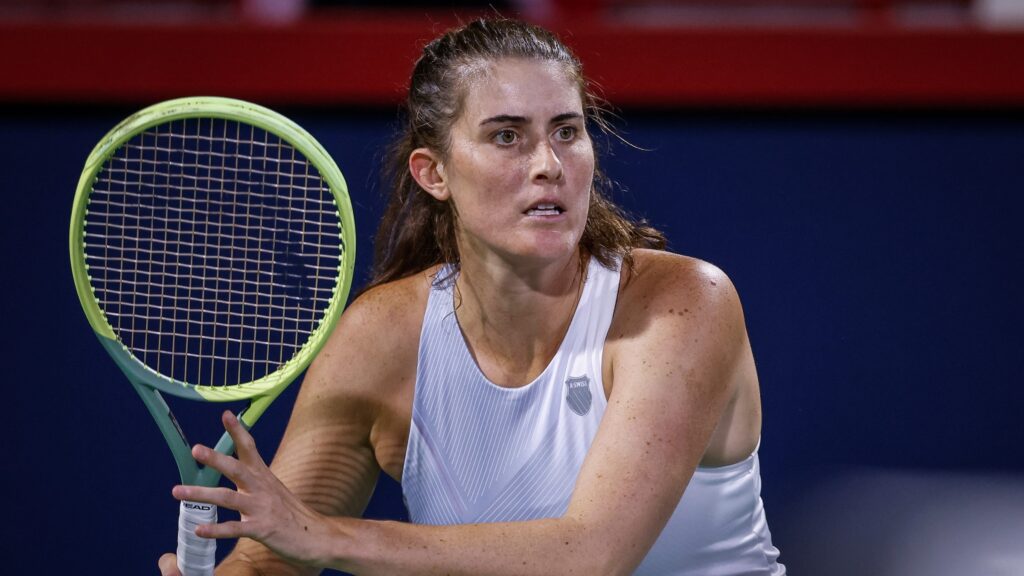 Rebecca Marino prepares to hit tennis ball