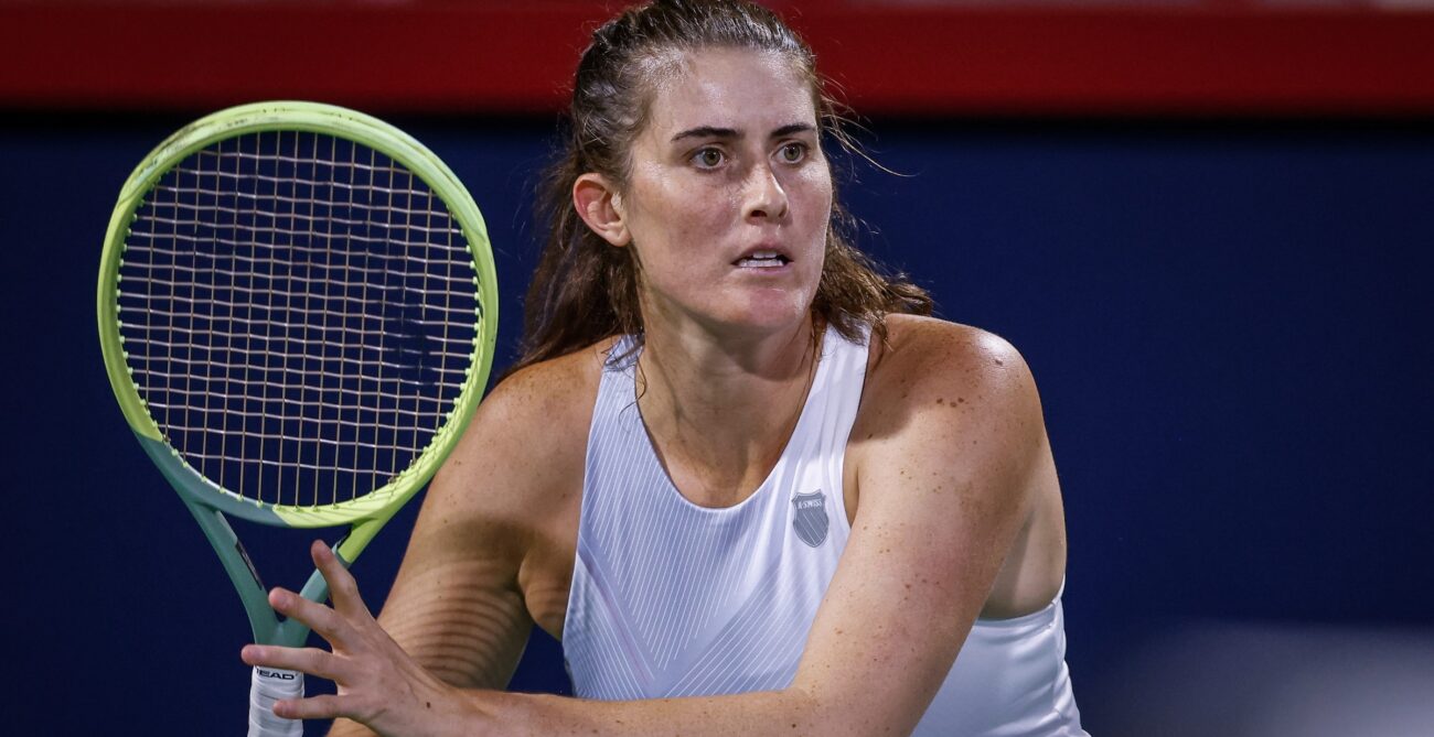 Rebecca Marino prepares to hit tennis ball