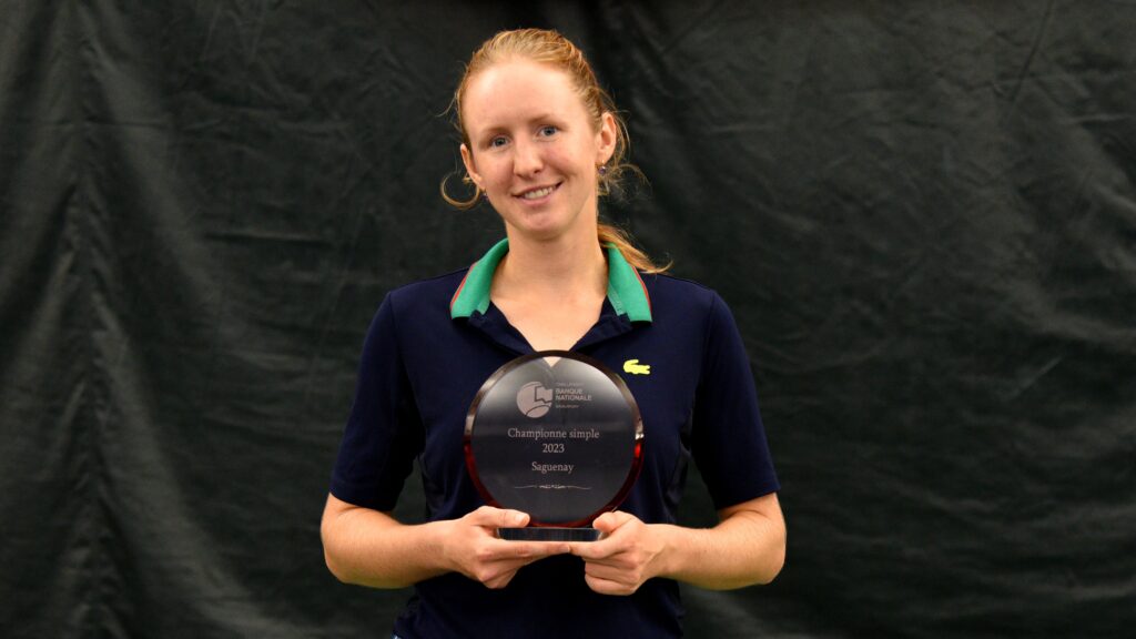 Katherine Sebov holds the trophy in Saguenay in 2023.