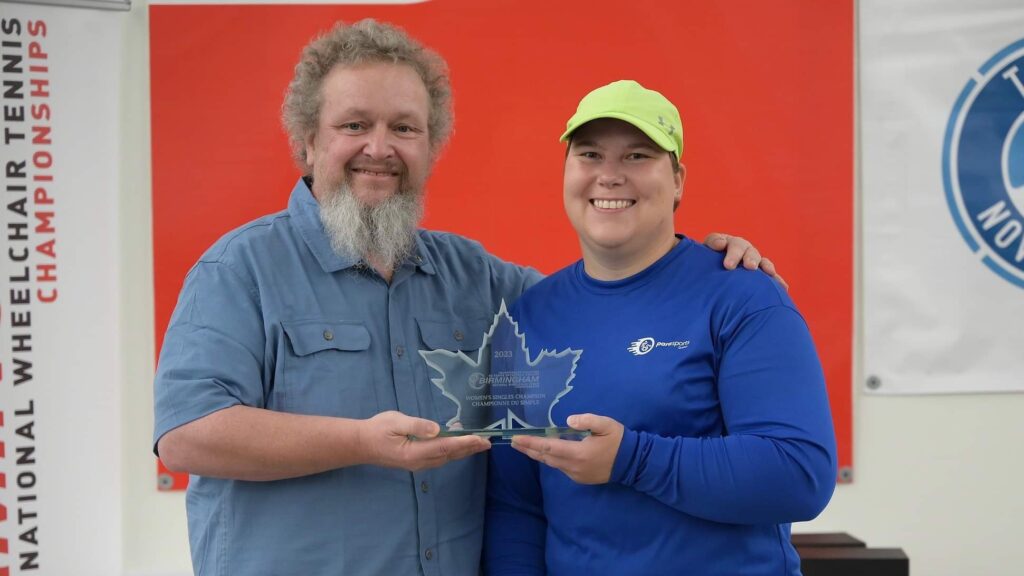 Natalia Lanucha (right) poses with her trophy.
