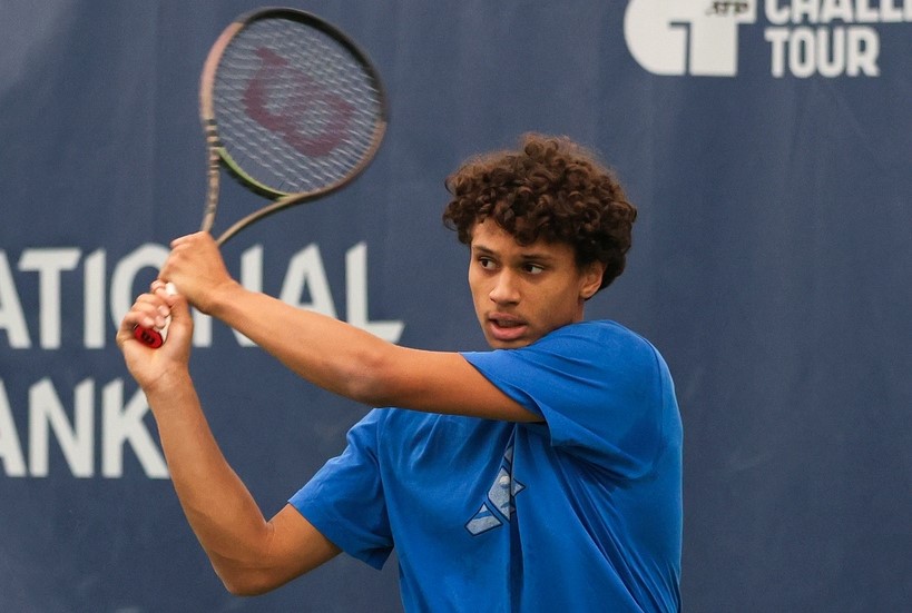 Gabriel Diallo follows through on a backhand.