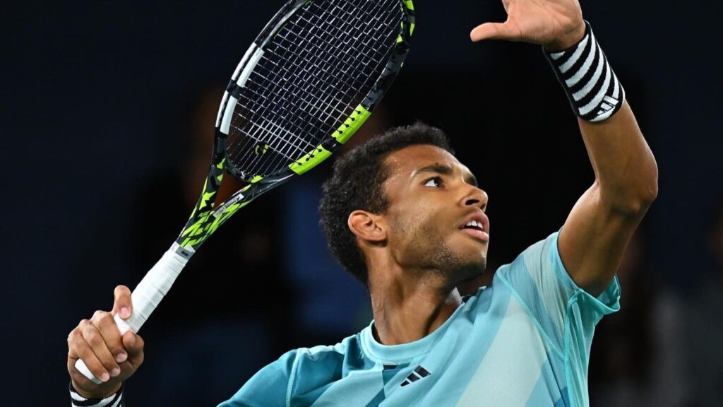 Felix Auger-Aliassime readies serve