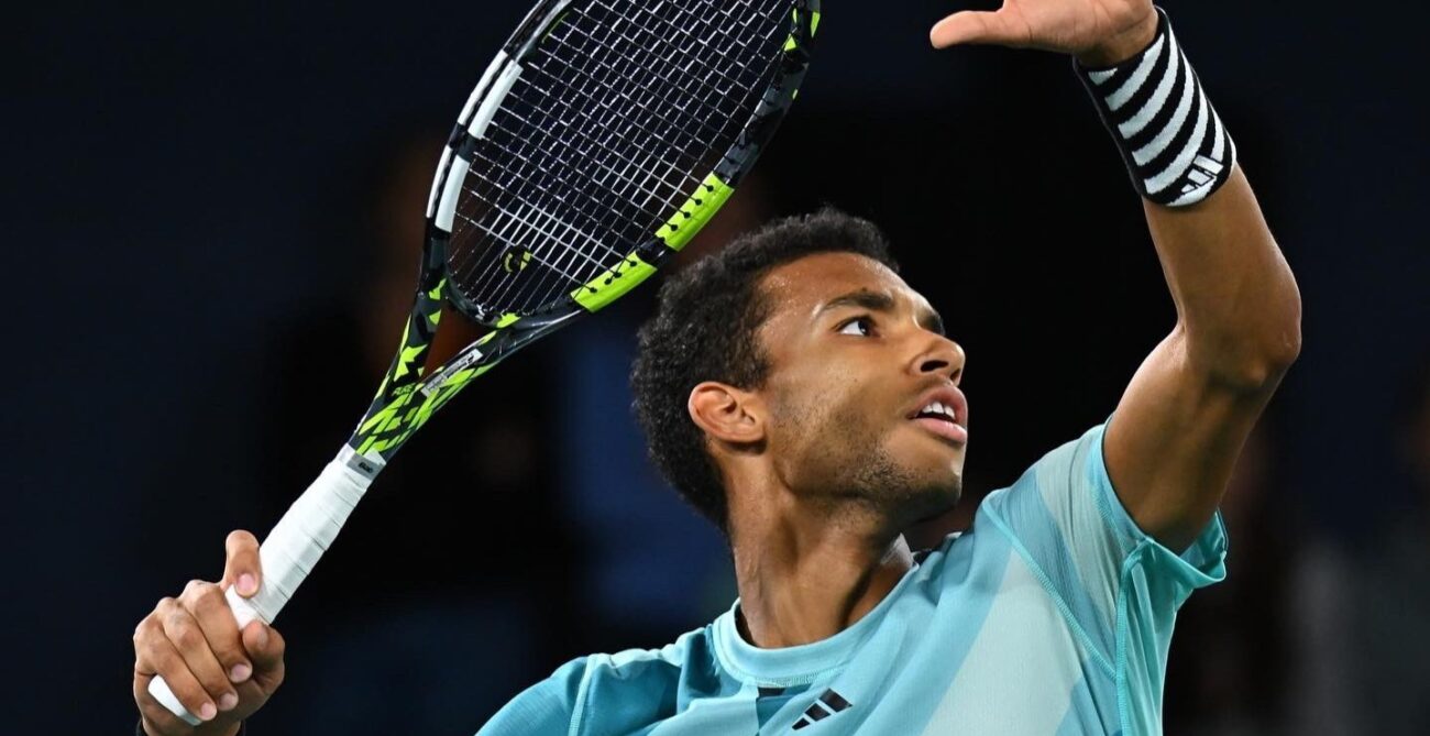 Felix Auger-Aliassime readies serve