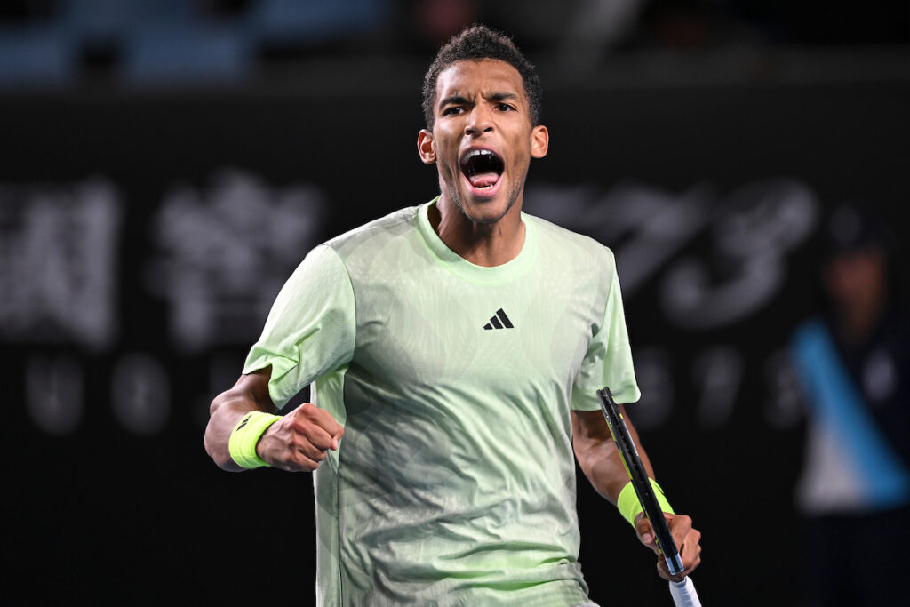 Felix Auger-Aliassime pumps his fist.
