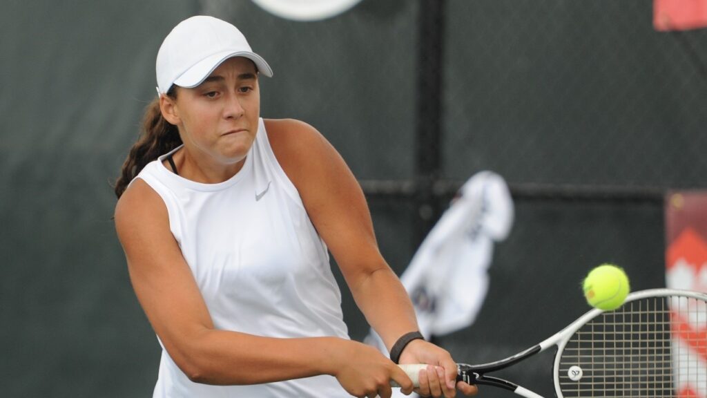 Junior player Andrea Taylor hits a backhand. She won a title last month in Norway on the ITF circuit.