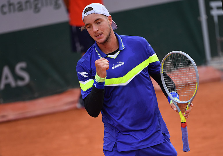 Struff pumps fist after winning point at BMW Open