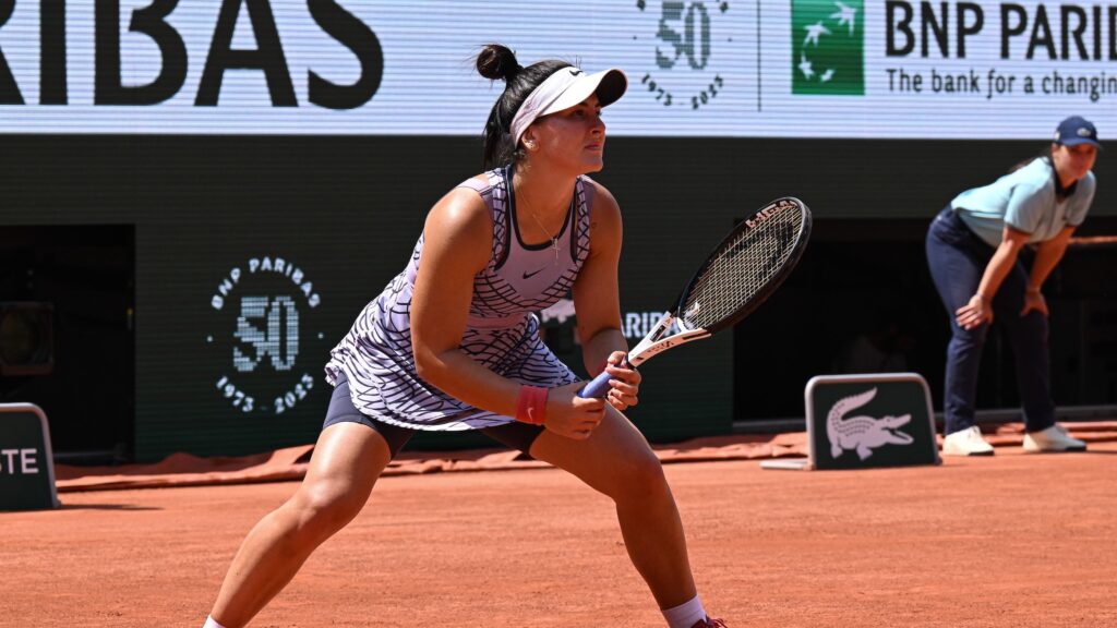 Bianca Andreescu, one of four Canadians remaining in the singles draws at the French Open on Monday, crouches and waits to return serve.