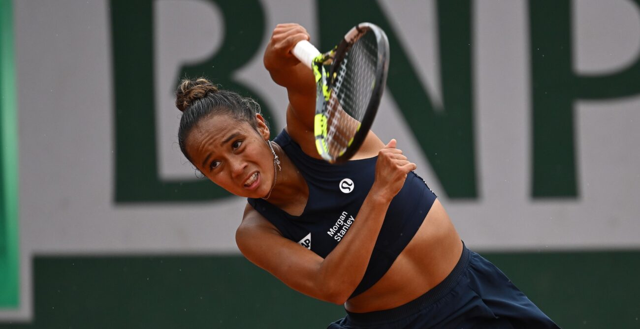 Leylah Fernandez follows through on a serve at the French Open. She lost to Ons Jabeur on Friday at Roland-Garros.