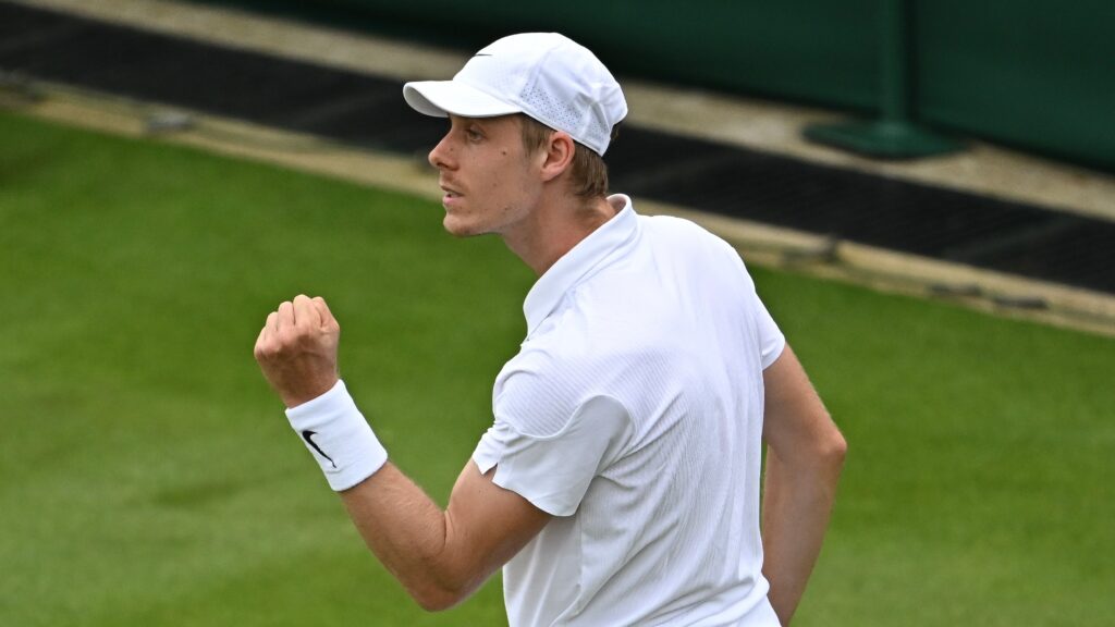 Denis Shapovalov pumps his fist. He beat Daniel Altmaier on Thursday at Wimbledon in five sets.