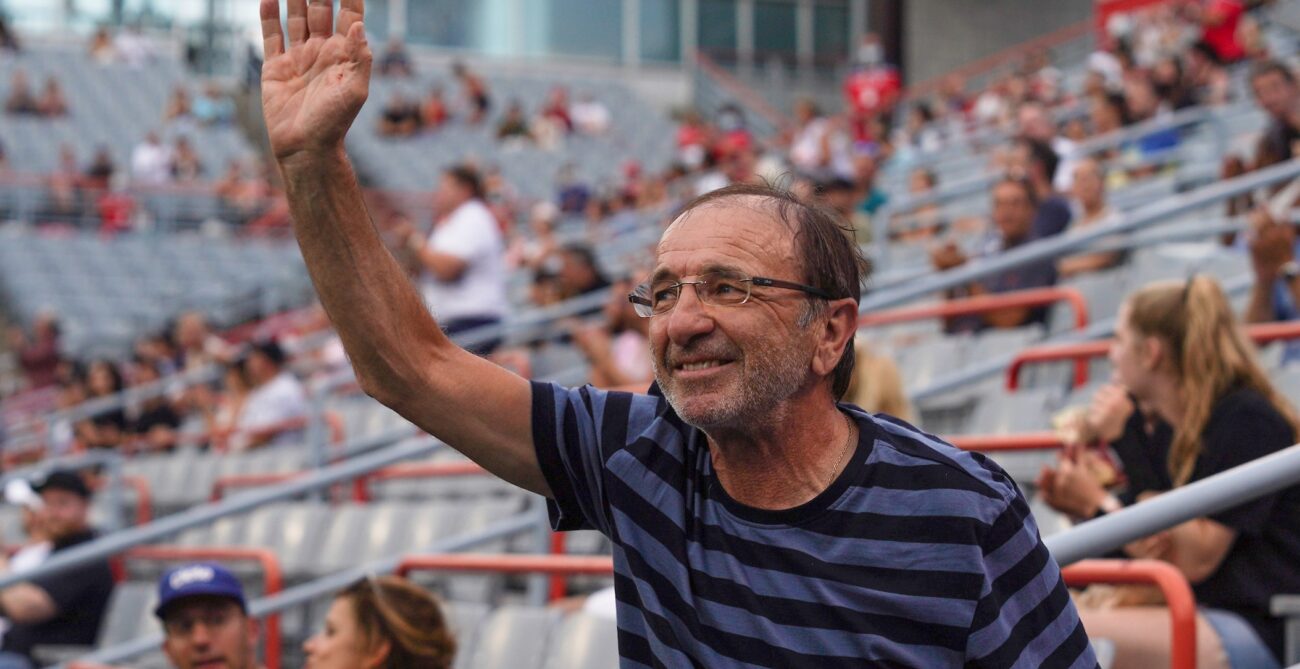 Louis Borfiga waves to the crowd in Montreal. He will be inducted into the Canadian Tennis Hall of