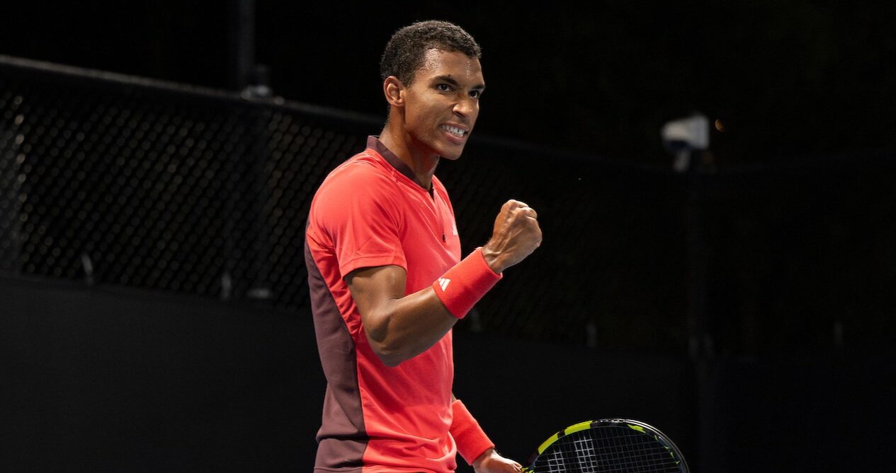Felix Auger-Aliassime pumps his fist. He beat Yunchaokete Bu in Montpellier on Friday.