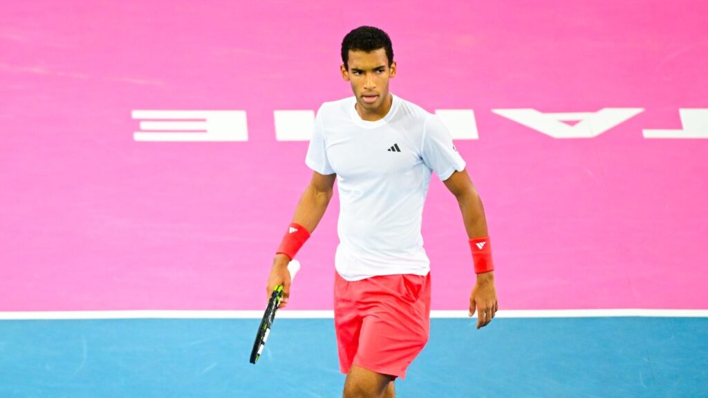 Felix Auger-Aliassime walked across the court in Montpellier.