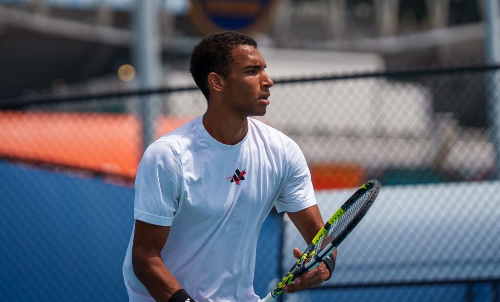 Felix Auger-Aliassime prepares to hit a shot in Miami.
