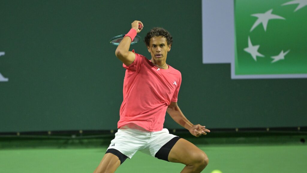 Gabriel Diallo follows through on a forehand in Indian Wells. He lost to Arthur Fils on Friday.