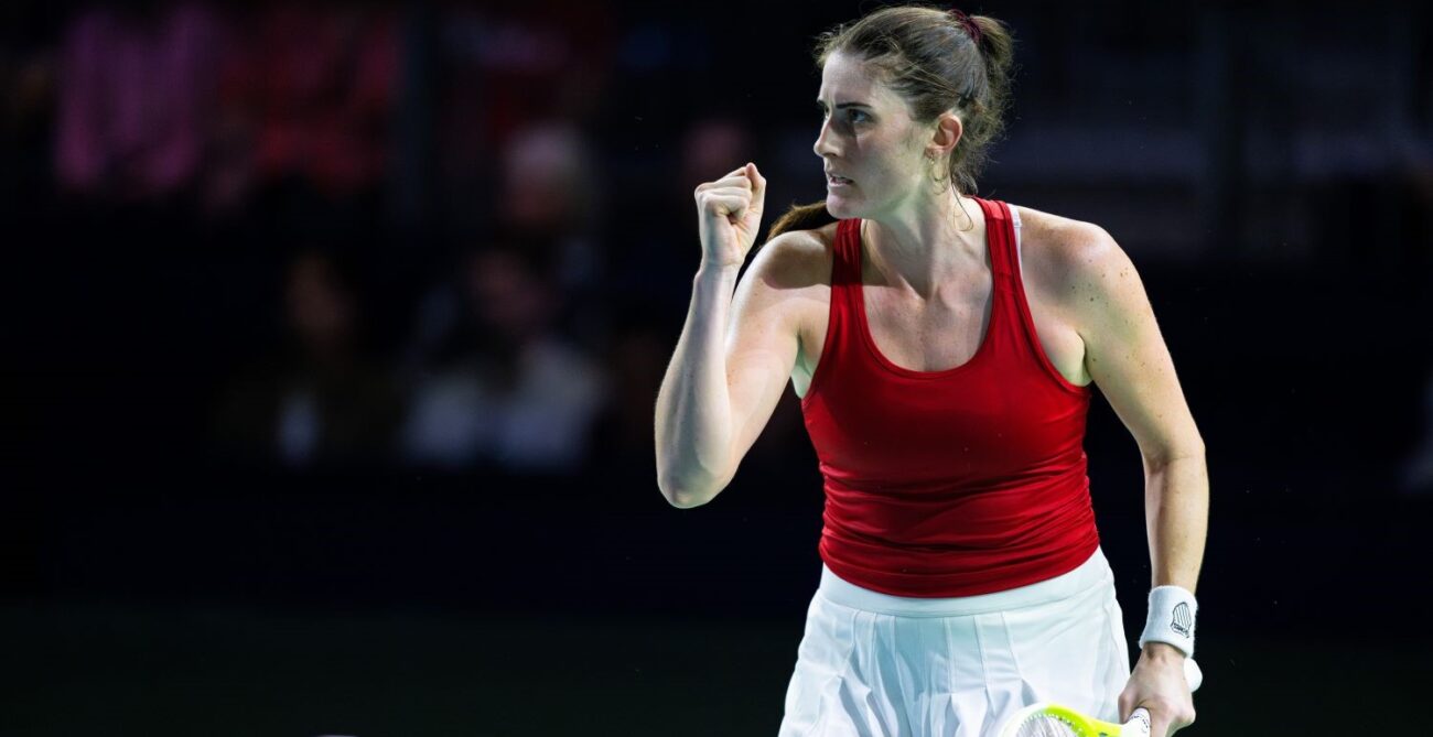 Rebecca Marino pumps her fist while representing Canada at the Billie Jean King Cup. She will be joined in April in the Qualifiers by Marina Stakusic, Victoria Mboko, Kayla Cross, and Ariana Arseneault.